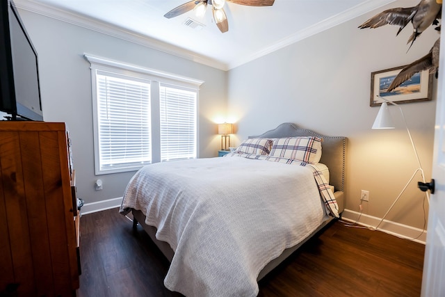 bedroom with ceiling fan, crown molding, and dark hardwood / wood-style flooring