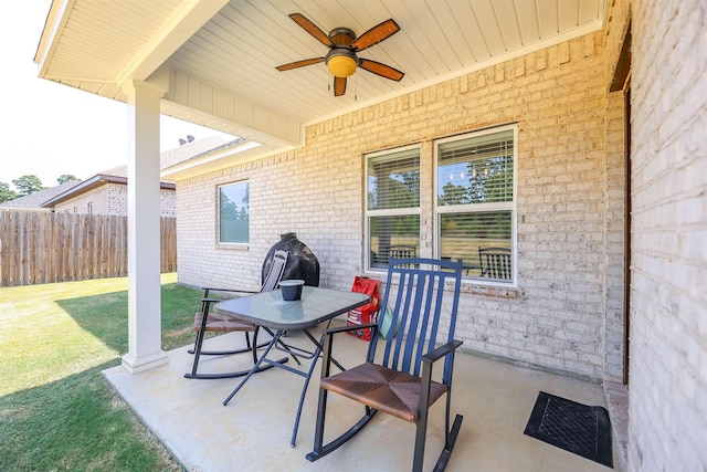 view of patio / terrace featuring ceiling fan