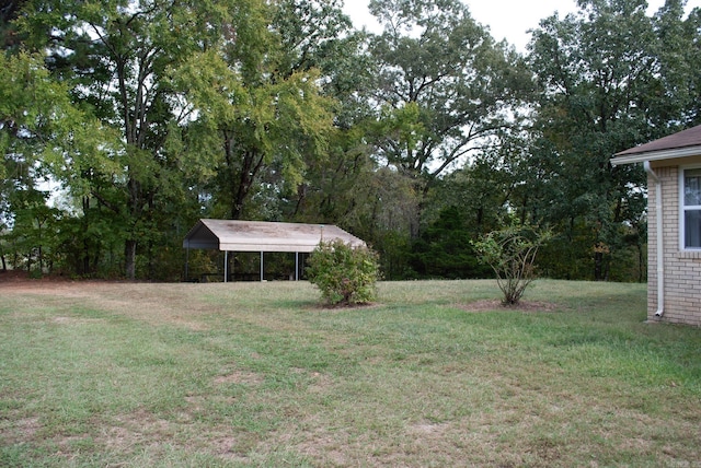 view of yard with a carport