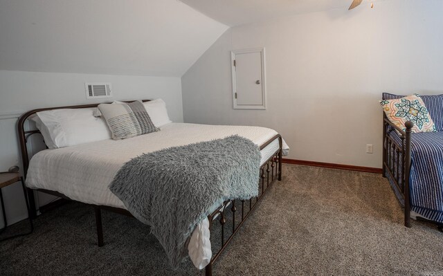 bedroom with ceiling fan, carpet flooring, and vaulted ceiling