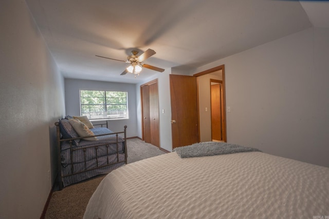 carpeted bedroom featuring ceiling fan