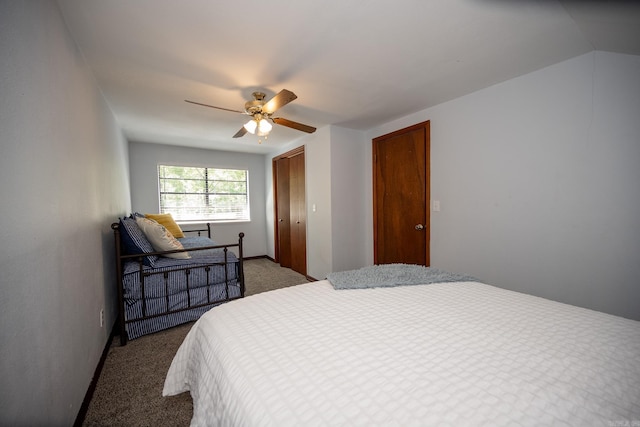 bedroom featuring ceiling fan and carpet