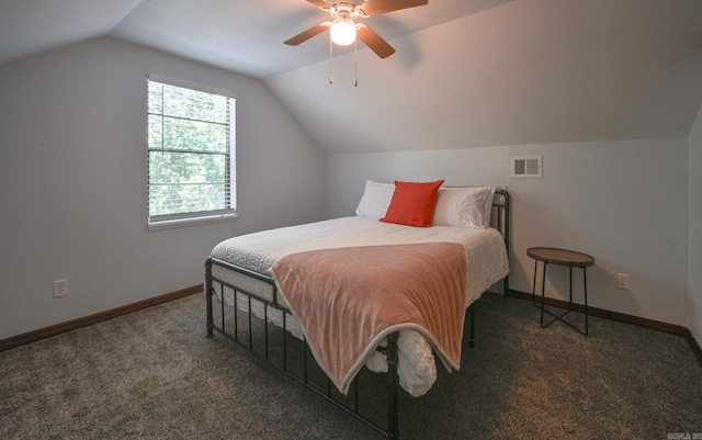 carpeted bedroom featuring ceiling fan and vaulted ceiling