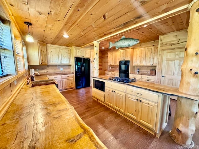 kitchen featuring wooden counters, wood ceiling, dark hardwood / wood-style flooring, wood walls, and black appliances