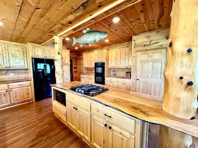 kitchen featuring wood walls, hardwood / wood-style floors, butcher block counters, wood ceiling, and black appliances