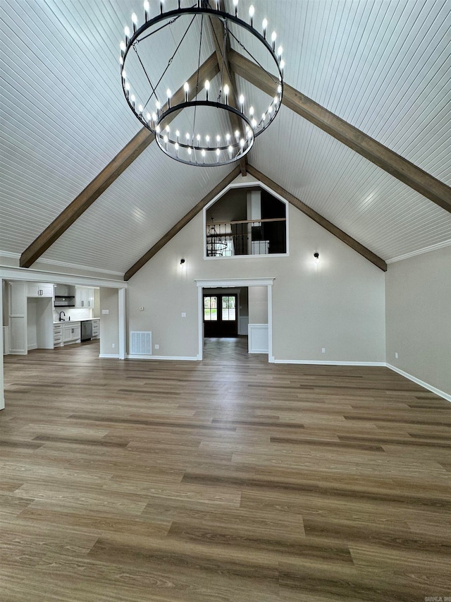 unfurnished living room featuring a chandelier, high vaulted ceiling, wood-type flooring, and beam ceiling