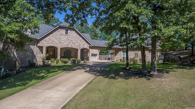1312 Stone Creek Ln, Jonesboro, AR 72401 - view of front of home featuring a garage and a front yard