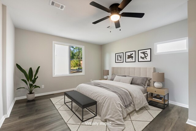 spare room featuring hardwood / wood-style floors and ceiling fan