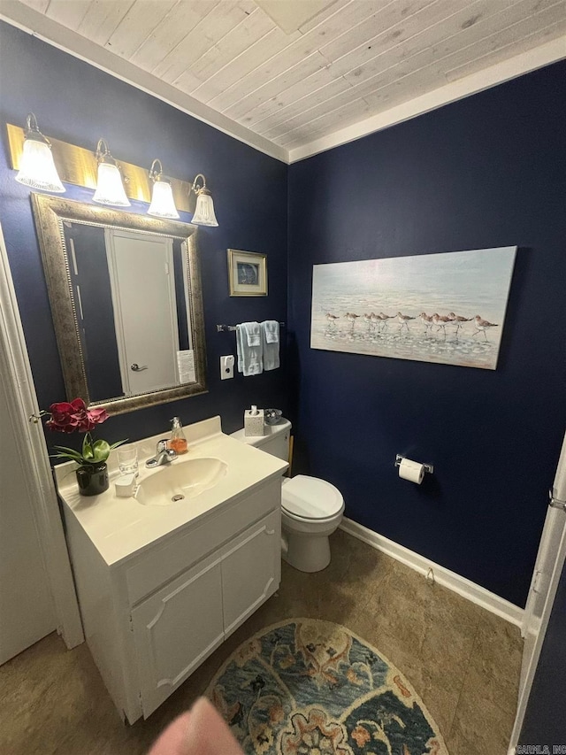 bathroom with wood ceiling, toilet, and vanity