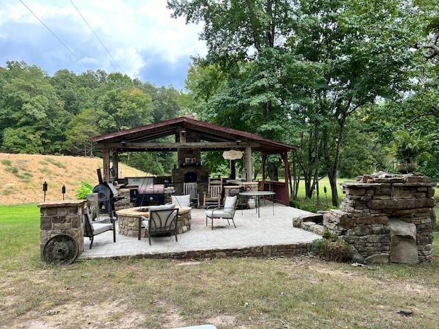 view of community featuring a gazebo and a patio