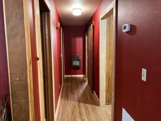 corridor featuring hardwood / wood-style flooring