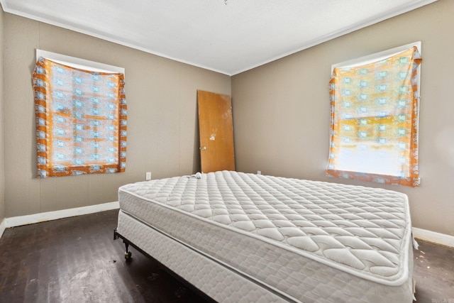 bedroom with hardwood / wood-style floors