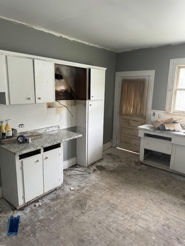 kitchen with white cabinetry