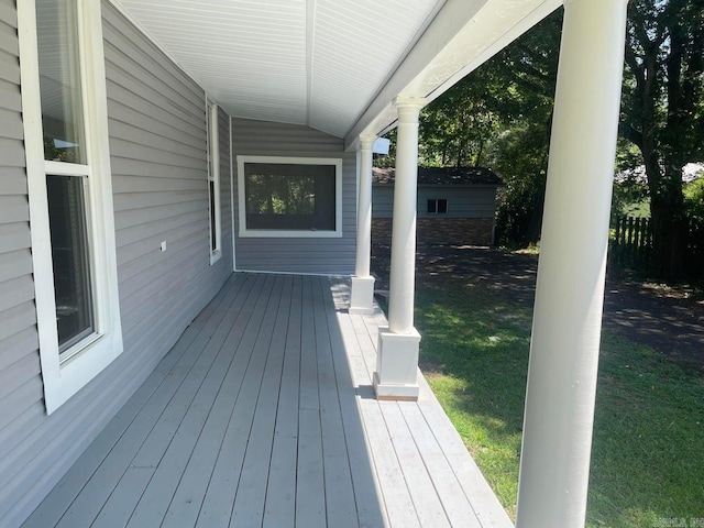 deck featuring a lawn