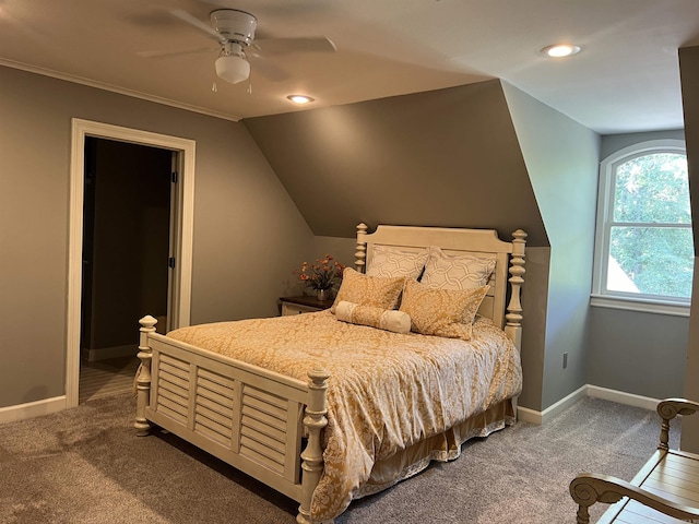 bedroom featuring carpet floors, lofted ceiling, and baseboards