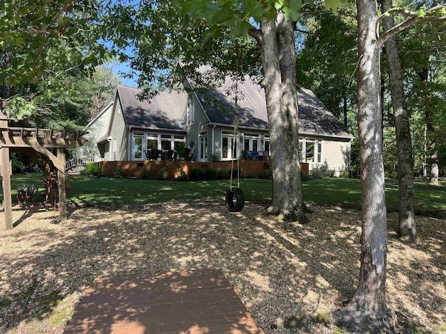 new england style home with crawl space, a wooden deck, and a front lawn