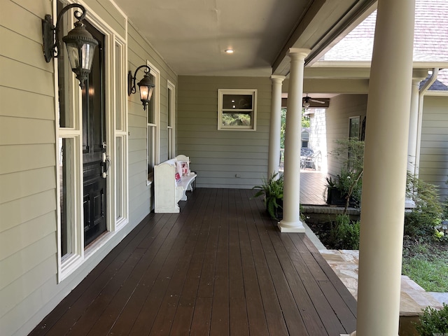 wooden terrace featuring a porch