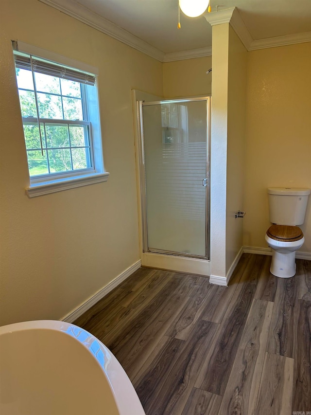 bathroom featuring independent shower and bath, toilet, ornamental molding, and wood-type flooring