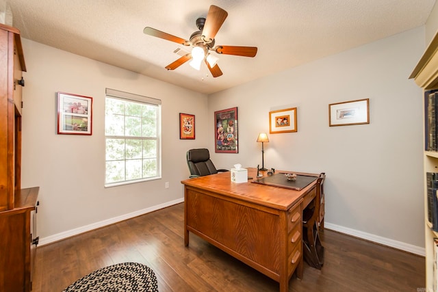 office area featuring ceiling fan, a textured ceiling, and dark hardwood / wood-style flooring