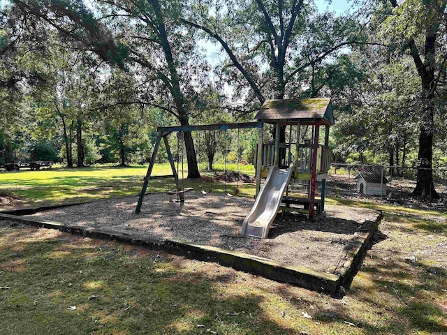 view of jungle gym with a yard