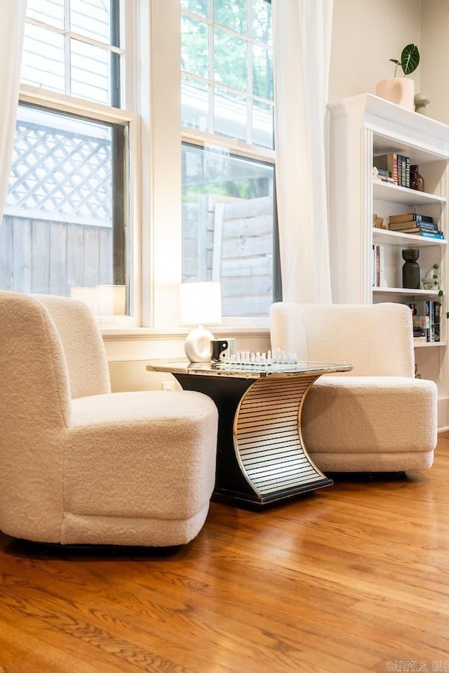 living area with wood-type flooring