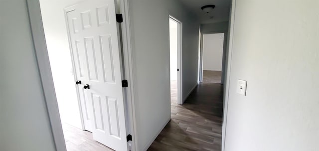 corridor featuring hardwood / wood-style flooring