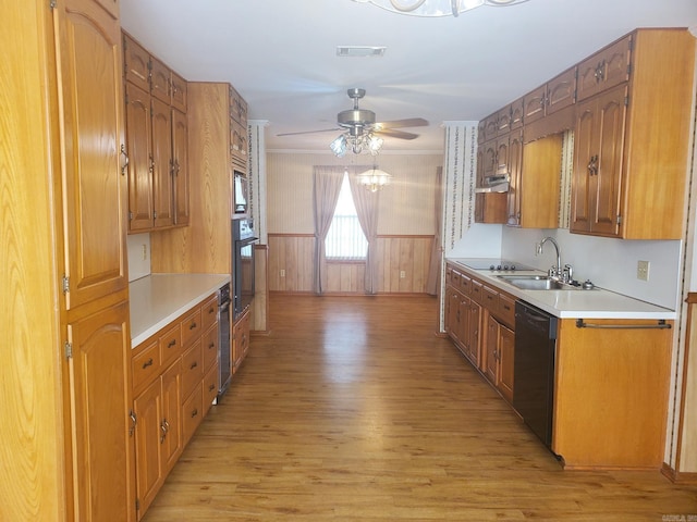1105 Crescent Dr, Mena, AR 71953 - kitchen featuring black appliances, a sink, light wood-type flooring, a ceiling fan, and ornamental molding