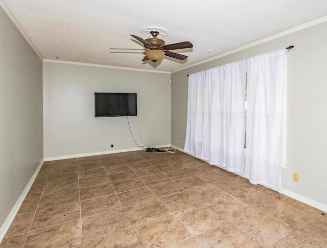 spare room with a textured ceiling, ceiling fan, and ornamental molding