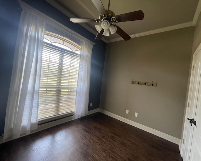 spare room with dark wood-style floors, ceiling fan, ornamental molding, and baseboards