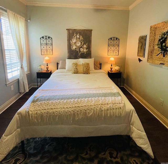 bedroom with baseboards, dark wood-style flooring, and crown molding