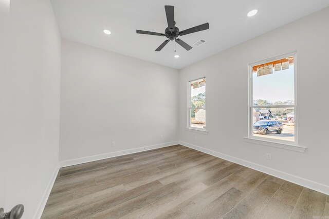 bathroom with concrete floors and a bath