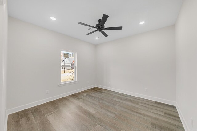 bathroom featuring vanity and hardwood / wood-style floors