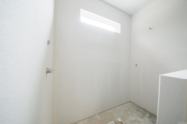 bathroom with concrete floors