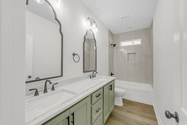 bathroom featuring hardwood / wood-style floors and shower with separate bathtub