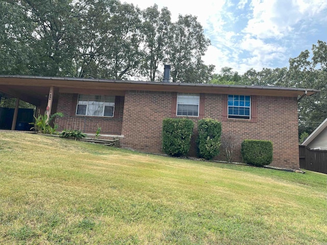 view of front of home with a front yard