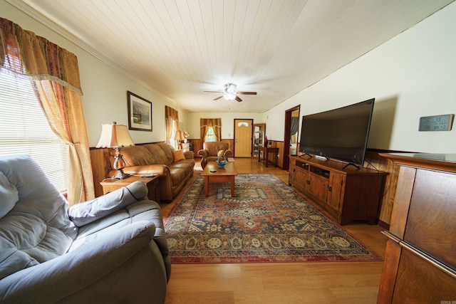 living room with ceiling fan and wood-type flooring