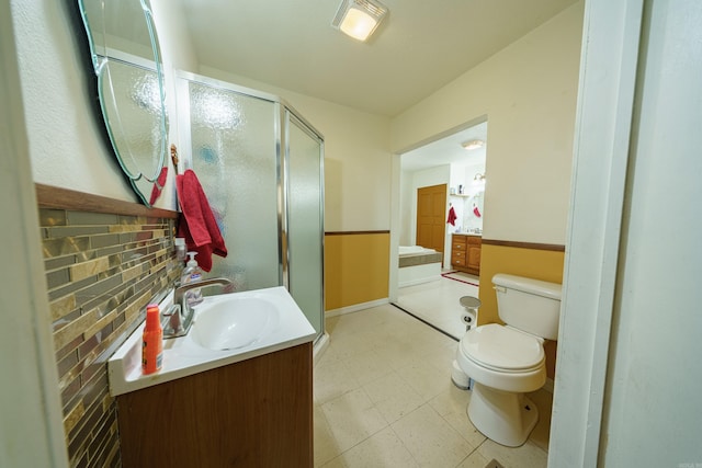 bathroom featuring an enclosed shower, tile patterned floors, tasteful backsplash, vanity, and toilet