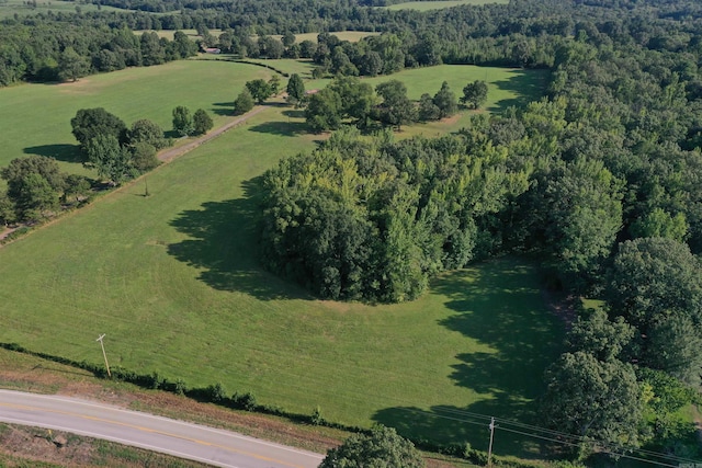 birds eye view of property with a rural view