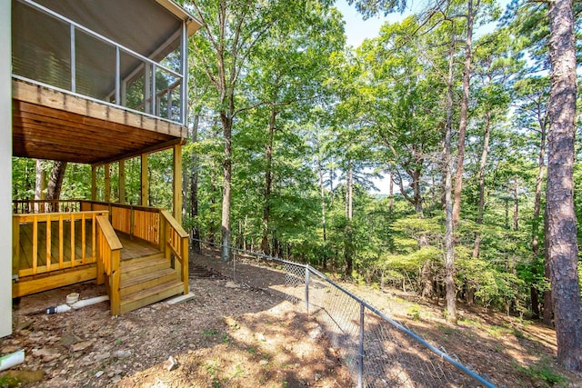 view of yard with a sunroom