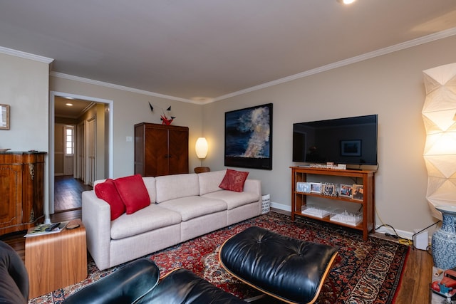 living room with crown molding and hardwood / wood-style floors