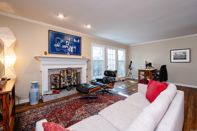 living room with ornamental molding and hardwood / wood-style flooring