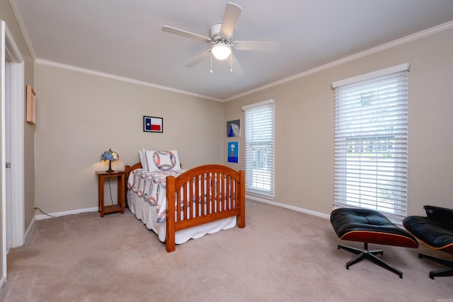 bedroom with ceiling fan, light carpet, and crown molding