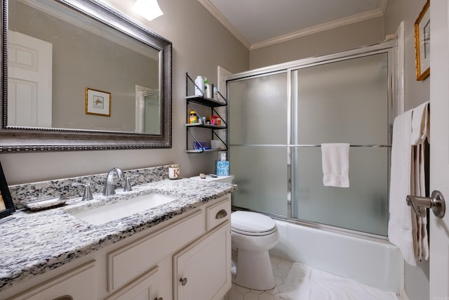 full bathroom featuring combined bath / shower with glass door, vanity, tile patterned flooring, crown molding, and toilet