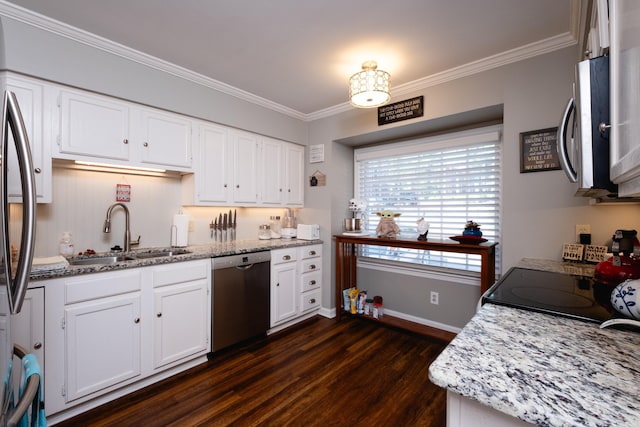 kitchen with dark hardwood / wood-style floors, ornamental molding, light stone countertops, sink, and stainless steel appliances