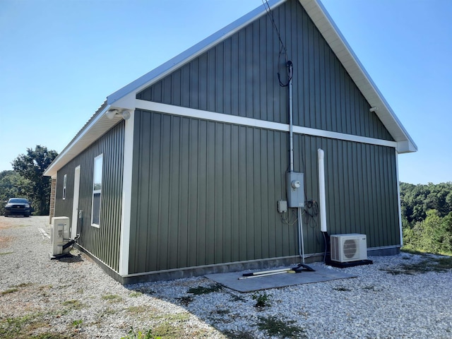 view of home's exterior with central AC