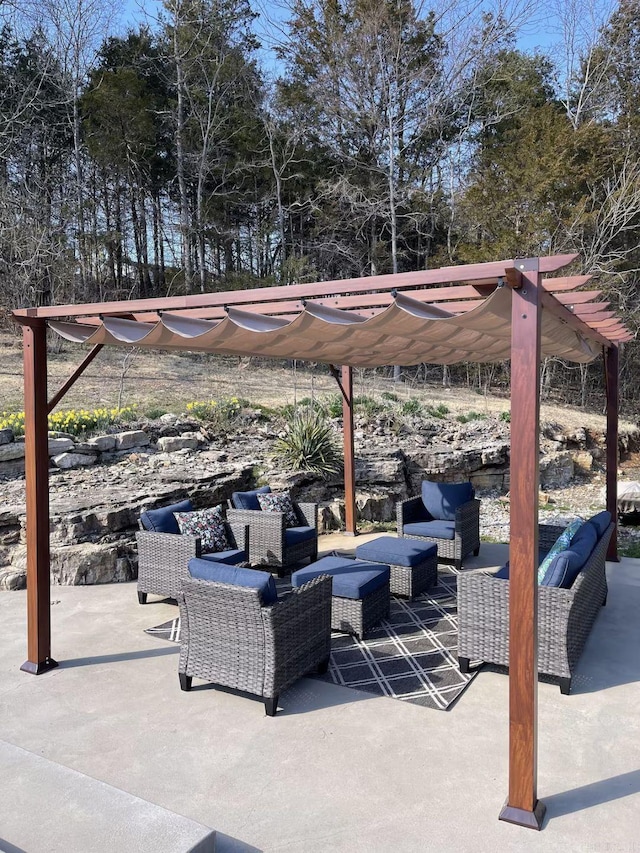 view of patio / terrace featuring a pergola and outdoor lounge area