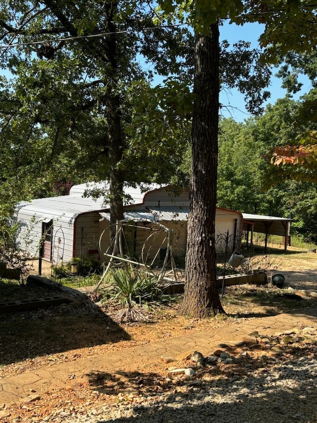 view of yard featuring a carport