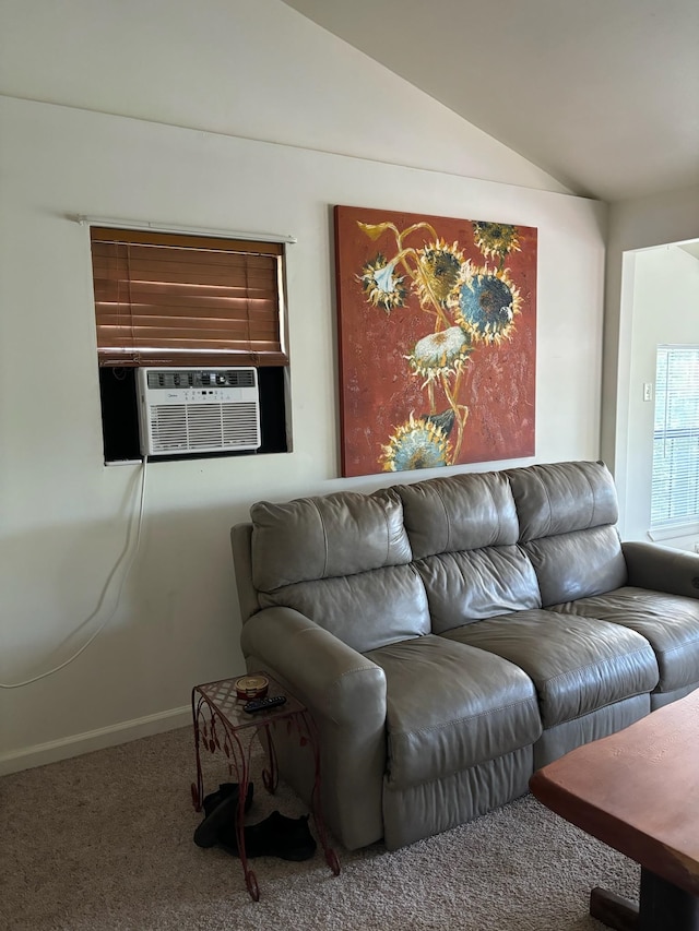 carpeted living room featuring cooling unit and vaulted ceiling