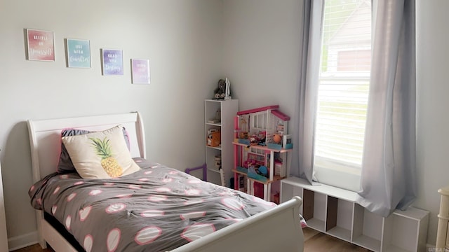 bedroom with multiple windows