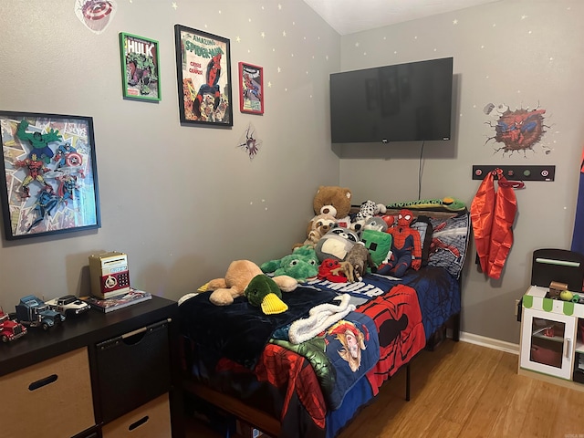 bedroom with light hardwood / wood-style floors